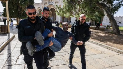 Israel blasted after riot police attack worshippers in Jerusalem's Al-Aqsa Mosque