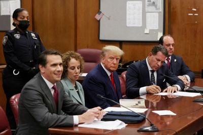 A wary US watches Trump in criminal court, hoping for justice