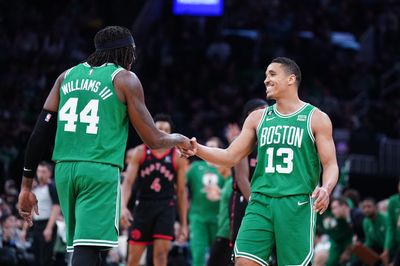Shorthanded Celtics secure No. 2 seed, outlast Raptors 97-93 behind big nights from Brown and Brogdon