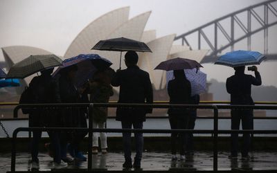 Aussies count coins and avoid rain with Easter at home