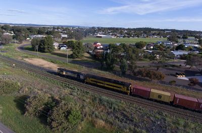 Albanese government commits to half of Inland Rail project after blowouts, delay and mismanagement