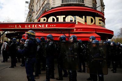 Pension protesters target Paris bistro favoured by Macron