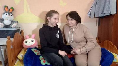 Russian girl who drew anti-war picture leaves orphanage with mother, commissioner says