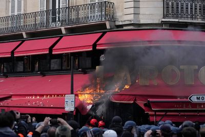 French protests: Paris workers throw dead rats at city hall in new clashes over pensions