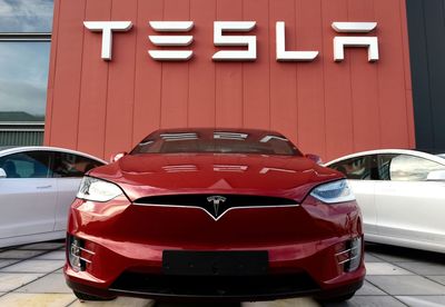 ‘We could see inside people’s garages’: Tesla cameras captured someone naked and employees shared the video internally, says report