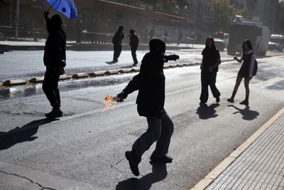 Chile enacts laws, allots $1.5 billion to fight crime amid police killings