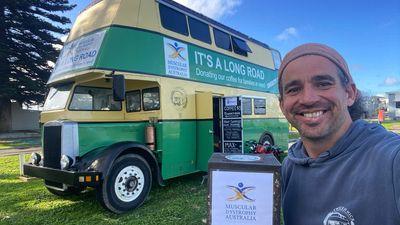 Restored 1949 double-decker bus hits road as tiny home and gallery, serving coffee for charity on 29,000km trek