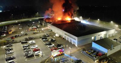 Fire breaks out at Jaguar car dealership as nine engines and drones battle blaze