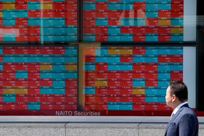 Asian stocks mixed ahead of US job market update