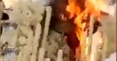 Worshippers in tears as Virgin Mary figure bursts into FLAMES during Easter parade