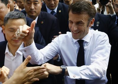 Macron mobbed at university on final day of China trip