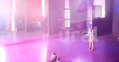 Moment gymnast plunges to ground during circus act as he fights for life in hospital