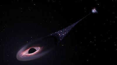 Runaway supermassive black hole is hurtling through space followed by tail of infant stars (video)