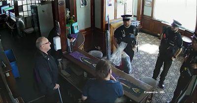 Cops storm pub and seize dolls after hate crime complaint