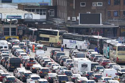 Holidaymakers forced to wait for hours amid large queues for trains and ferries
