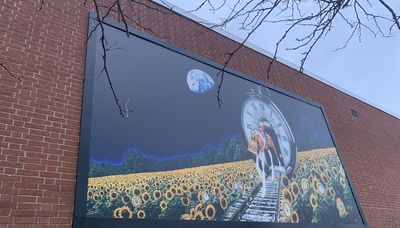 In AJ Paliev’s Deerfield mural, horse, rider keep ‘marching forward . . . to an unknown place’
