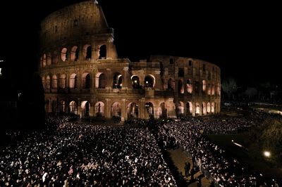 Pope Francis skips traditional Good Friday procession at the Colosseum in chilly Rome