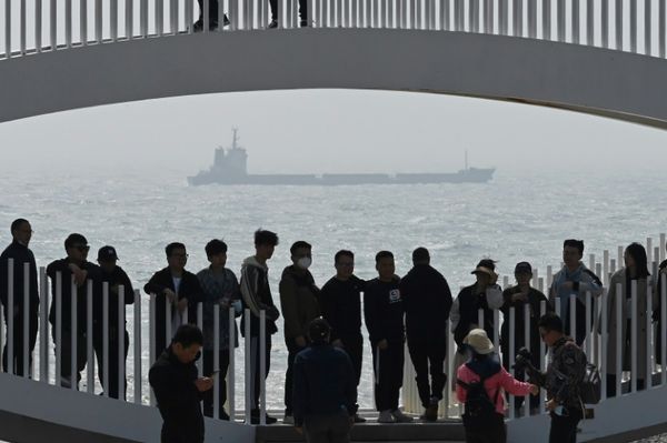 Chinese seaside tourists brush off military drills over Taiwan
