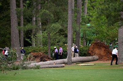 Rahm lurks as delayed Masters second round resumes