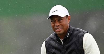 Tiger Woods sinks to BOTTOM of Masters leaderboard before third day abandoned in Augusta