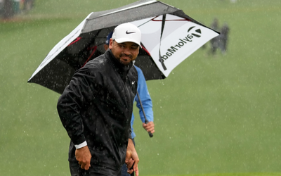 Aussie contenders slip down the Masters leader board as extreme weather suspends play