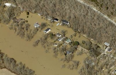 Officials in flood-prone counties use several strategies to reduce damage to people, property