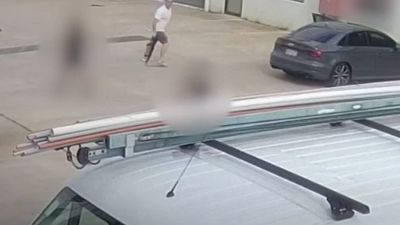 Police urge 'armed, dangerous, irrational' man to hand himself in as alarming CCTV footage of firearm discharge released