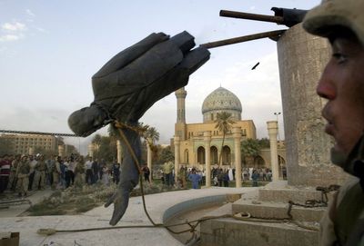 Once everywhere, Saddam's image scrubbed from Baghdad