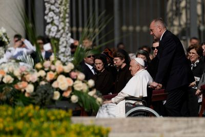 Pope, big crowd mark Easter in flower-adorned Vatican square