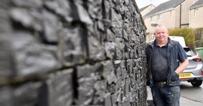 Man builds 6ft wall outside home for 'security' - now council want it demolished