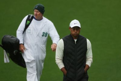 Facing marathon, Woods withdraws from Masters