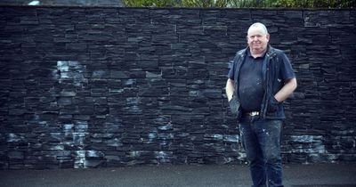 Man spends £5k on 6ft 'security' wall outside home but council want it bulldozed