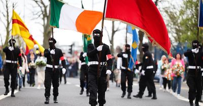 West Belfast Easter parade 'masked colour party' investigation launched