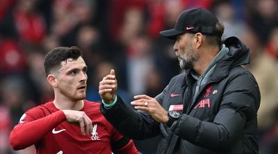 WATCH: Referee's assistant appears to elbow Liverpool's Andy Robertson in face