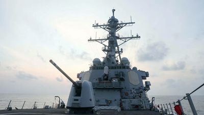 US warship sails near manmade Chinese-controlled isle in S.China Sea