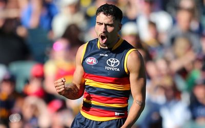 Adelaide’s Izak Rankine highlights online racial abuse after Crows’ win