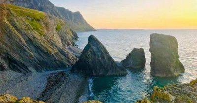 The Welsh 'rustic little gem' beach that sits at the foot of a mountain