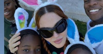 Youthful Madonna dons bunny ears as she celebrates Easter with large family