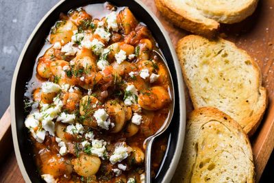 Briny feta makes a full meal of tomatoey Greek baked beans