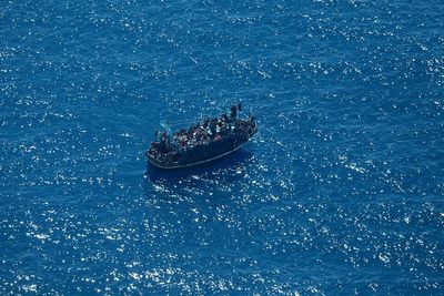 2 dead, 20 missing as migrant boat sinks off Tunisia