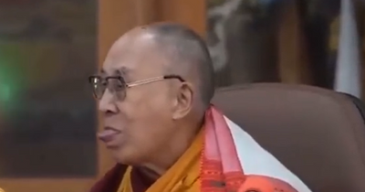 Dalai Lama apologises after video shows him asking little boy to 'suck my tongue'