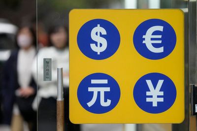 Asian shares mostly higher after mixed day on Wall Street