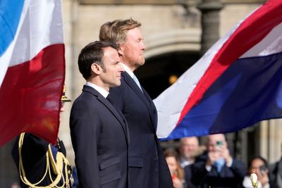 Macron visits Netherlands after Taiwan comments make waves