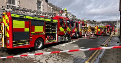 Fire guts bedroom of apartment in Swansea street as multiple emergency services rush to scene