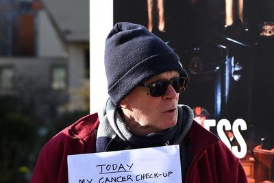 Cancer patient supports striking doctors on picket line as check-up delayed