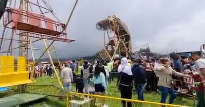 Nine injured as fairground ride collapses leaving some trapped 'dangling in the air'