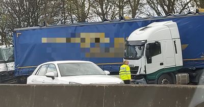 Chaos as M62 closed for hours after lorry crash causes spillage with one taken to hospital