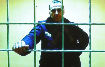 Jailed Kremlin critic Navalny says he is back in solitary, conditions 'hellish'