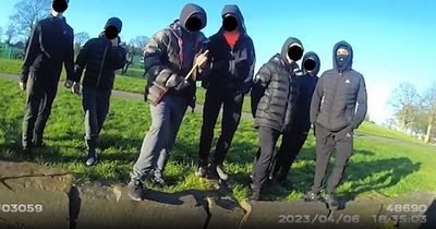 Police warn parents of masked children to 'expect a visit' after group surround officers