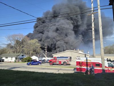 An industrial fire in Indiana sends massive clouds of black smoke into the sky